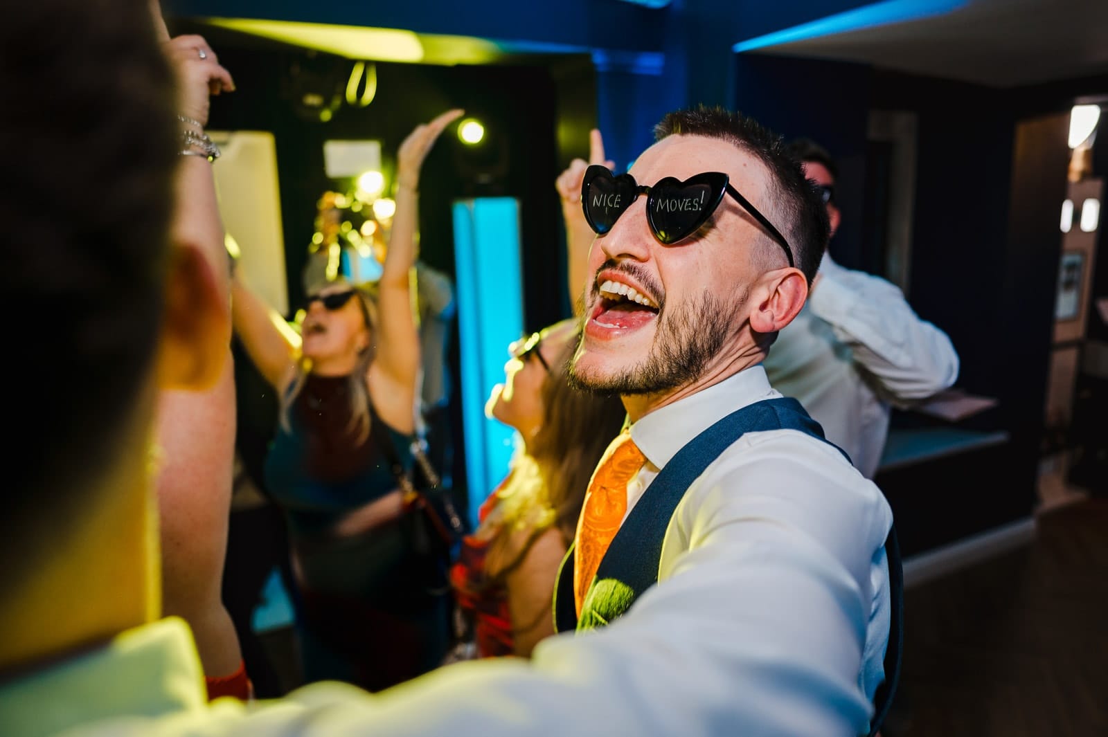 Groom dancing to the DJ's set