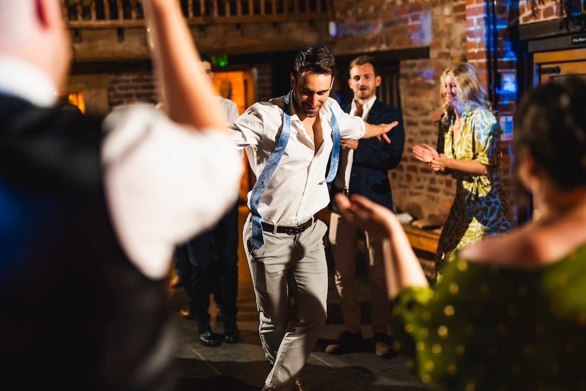 man busting his moves at the private party event
