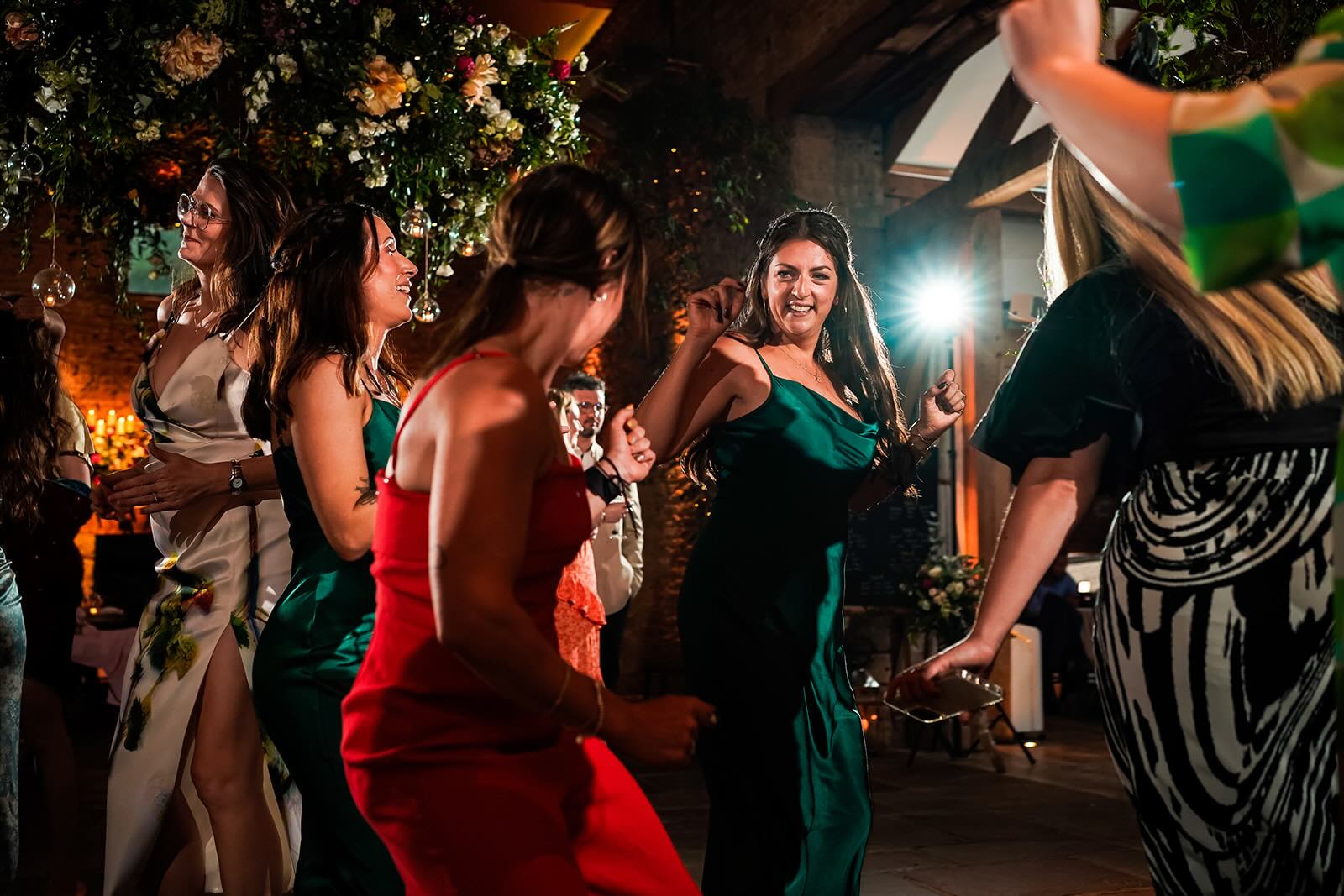 Wedding guests dancing at Cripps Barn in the Cotswolds