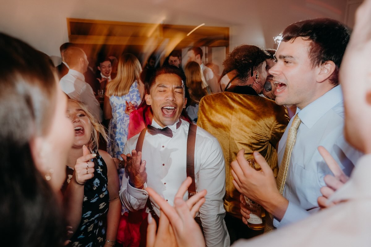 Guests dancing during a wedding reception at Hyde House