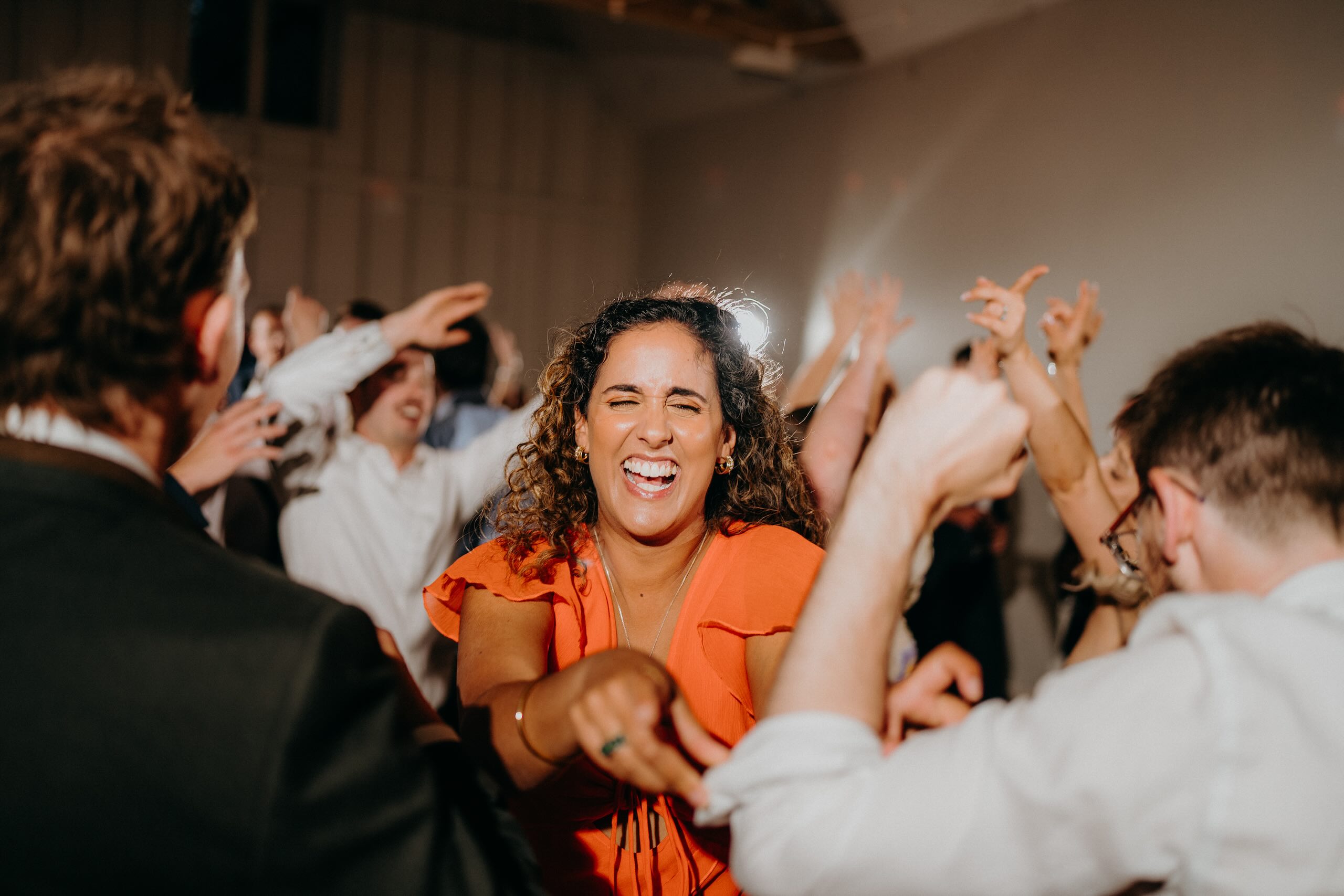 Wedding guest dancing during the evening party at Hyde House
